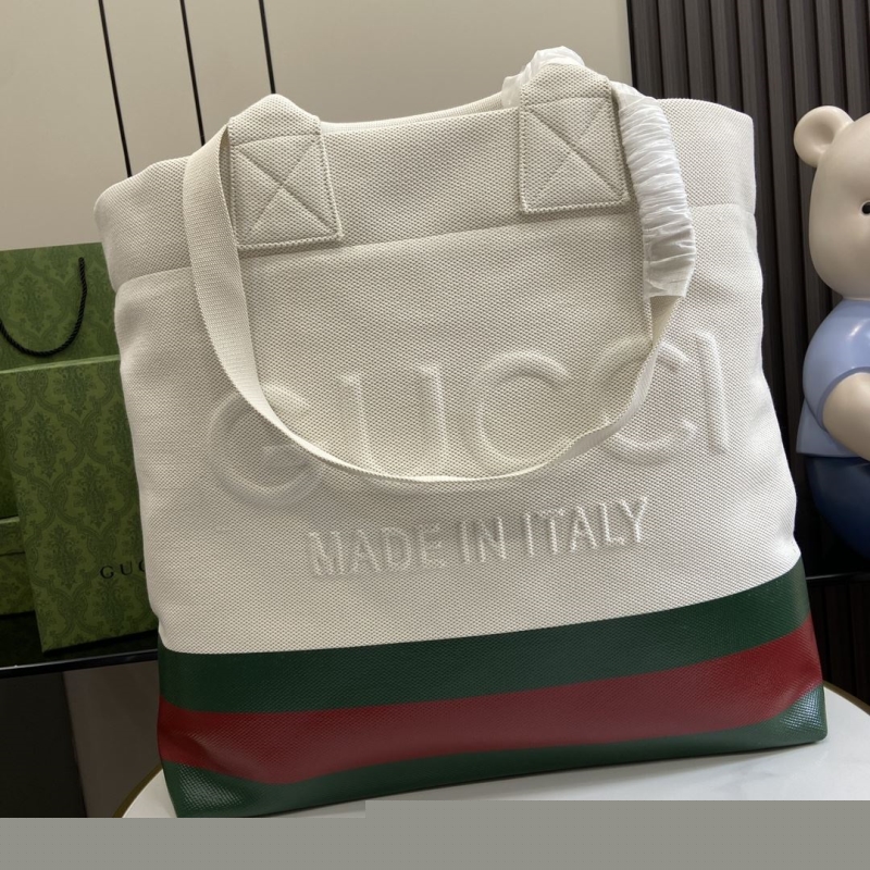 G*u*i shopping bags